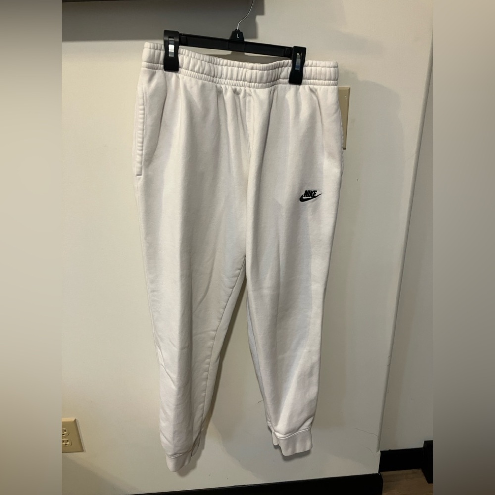 4 for 1 $: 2 Nike Sweats, 1 Nike lightweight pant, and 1 Quiksilver T: Mens L
